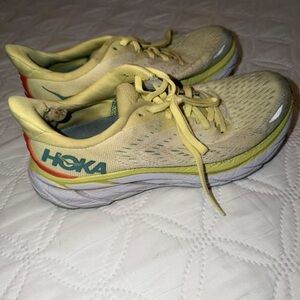 Hoka Women's Pale Yellow Athletic Running Shoes with Teal Logo
